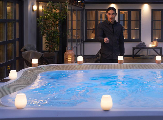 LED candles outdoors on a hot tub